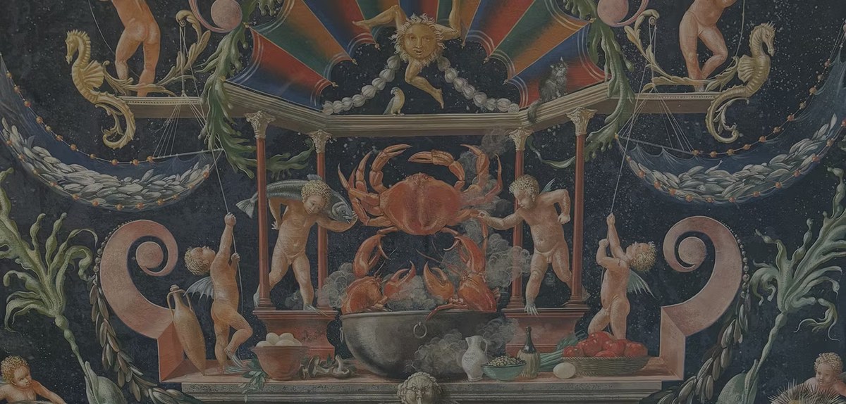 Renaissance-style grotesque mural with a crab, cherubs and a sun face